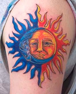 Tribal sun tattoo