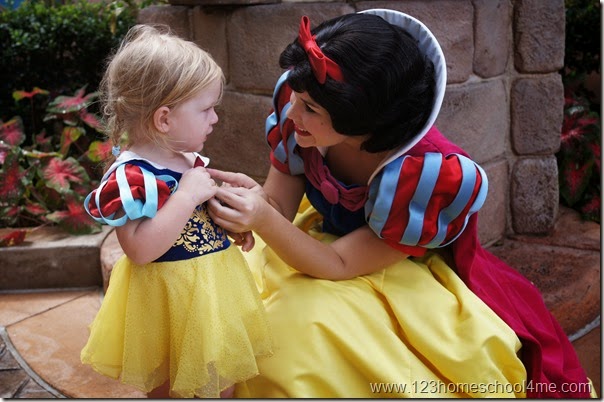 Cheap Disney World Vacation meeting snow white at Epcot