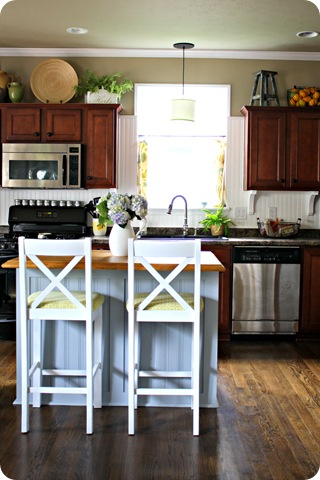 dark cabinets light island