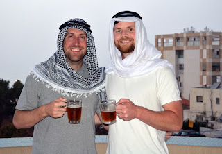 craig baumer and chad jensen sporting palestinian keffiyeh headdress from the west bank