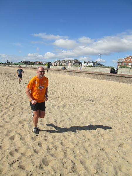 Ian running on the sand