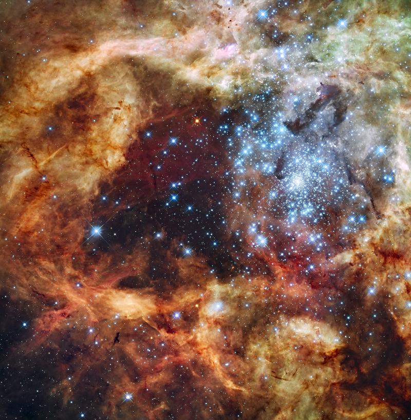 R136 resides in the 30 Doradus Nebula, a turbulent star-birth region in the Large Magellanic Cloud (LMC)