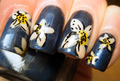 Nelly Polish Night Sky with floral nail art