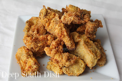 Deep fried oysters, dipped in nothing but cornmeal and quick fried in a deep fryer - simple and perfect.