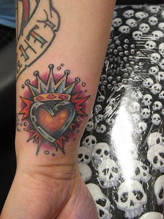 Crown Tattoo with Heart on Wrist