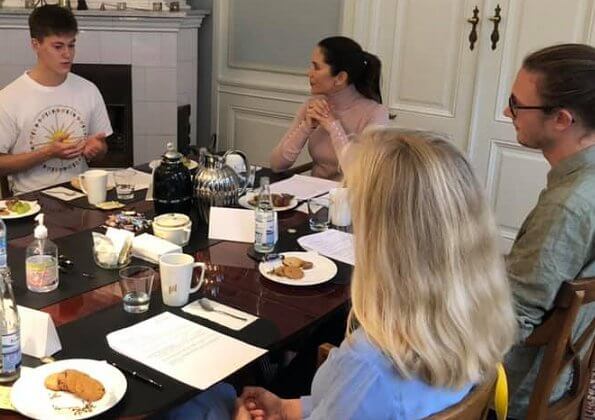 Crown Princess Mary wore a turtleneck pink sweater from Zara. Princess Mary wore black check satin pussy-bow blouse from Lanvin