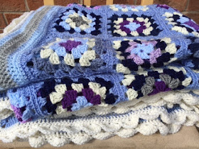 Blue and purple granny square crochet blanket