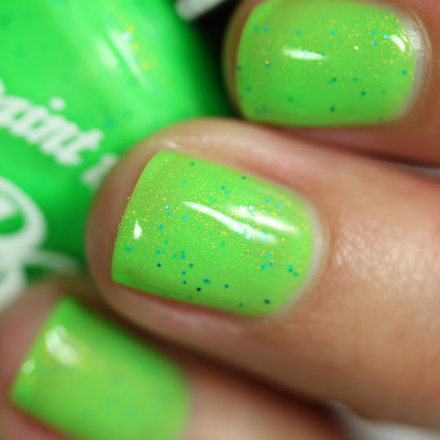 neon green nail polish with tiny blue glitters and sparkle