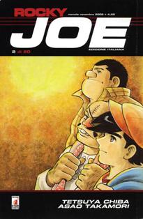 Rocky Joe 2 - Novembre 2002 | CBR 215 dpi | Mensile | Fumetti | Manga | Shounen | Azione | Fantasy
Numero volumi : 20
Rocky Joe è un shounen manga di Tetsuya Chibae Asao Takamori per la Kodansha, mentre in Italia la pubblicazione è stata a cura della Star Comics.
Fino a poco prima della pubblicazione di Ashita no Joe, in Giappone l'idea diffusa era che i manga fossero un prodotto rivolto solo ai bambini.
La storia di Joe Yabuki conquistò invece il pubblico di tutte le età, tanto che il suo successo continua tutt'oggi, e il personaggio è divenuto una sorta di icona popolare.
All'epoca della prima pubblicazione su rivista, nacque il modo di dire «tenere l'Asahi Journal nella mano sinistra e Shonen Magazine nella mano destra», che stava a significare la fruibilità di Ashita no Joe anche per adulti che normalmente leggono i quotidiani.
Girovagando per Tokyo il giovane Joe Yabuki, orfano senza casa e senza denaro, viene alle mani prima con una banda di ragazzini di un quartiere dormitorio e poi rincara la dose con un gruppo di Yakuza dimostrando, durante le due risse, di avere delle capacità fisiche fuori dal comune.
Il vecchio «pugilomane» Dampei Tange, ex allenatore di pugilato ora senzatetto e alcolista, vede nel ragazzo una possibilità di tornare a testa alta nel mondo della boxe arrivando al successo lungamente sperato e sconfiggendo definitivamente i fantasmi del suo passato.