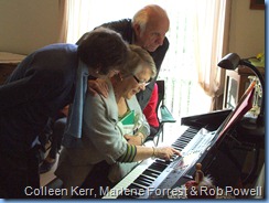 Colleen watching proceedings whilst Marlene Forrest sets-up with Rob Powell assisting