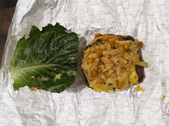 Wendy's Loaded Nacho Cheeseburger view of inside of both halves.