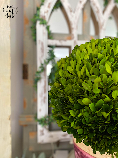 boxwood ball cathedral arch wrapped faux greenery