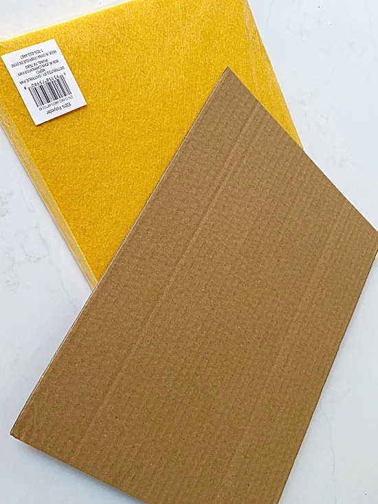 package of yellow felt and cardboard