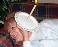 Jo Jo burning an ear candle