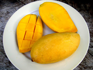 plate of yellow mango