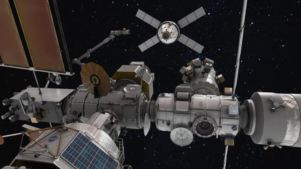 An artist's concept of NASA's Orion capsule approaching the Gateway space station.