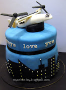 The plane is made from sugar and modeled after the Osprey aircraft. (mycakealley )