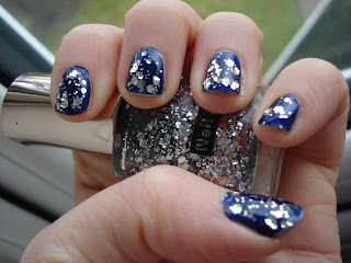 Saffron large silver glitter over Barry M Nail Paints in navy blue shimmer