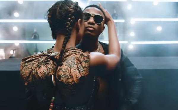 See What Wizkid Was Caught Doing To A Lady During Music Video Shoot. [Pictures Attached]