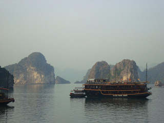 Junk boat sailing in Halong Bay