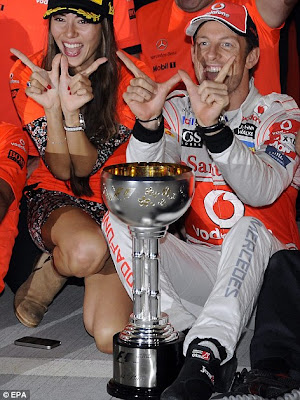  embraces girlfriend Jessica Michibata after winning Japanese Grand Prix
