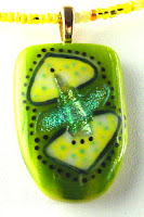 Bullseye, Wasser, and dichroic glass with enamel