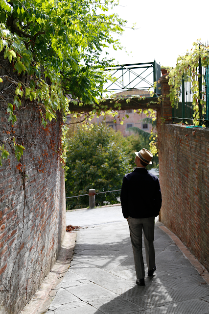 Paul Walking down Cobbled Street in San Miniato, Tuscany, Italy