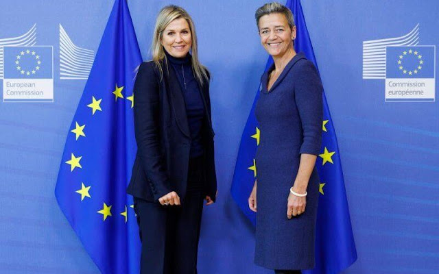 Queen Maxima wore a navy blue blazer, suit by MaxMara. Executive Vice-President of the European Commission Margrethe Vestager
