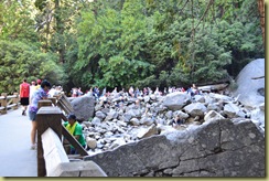 People at the base of lower falls