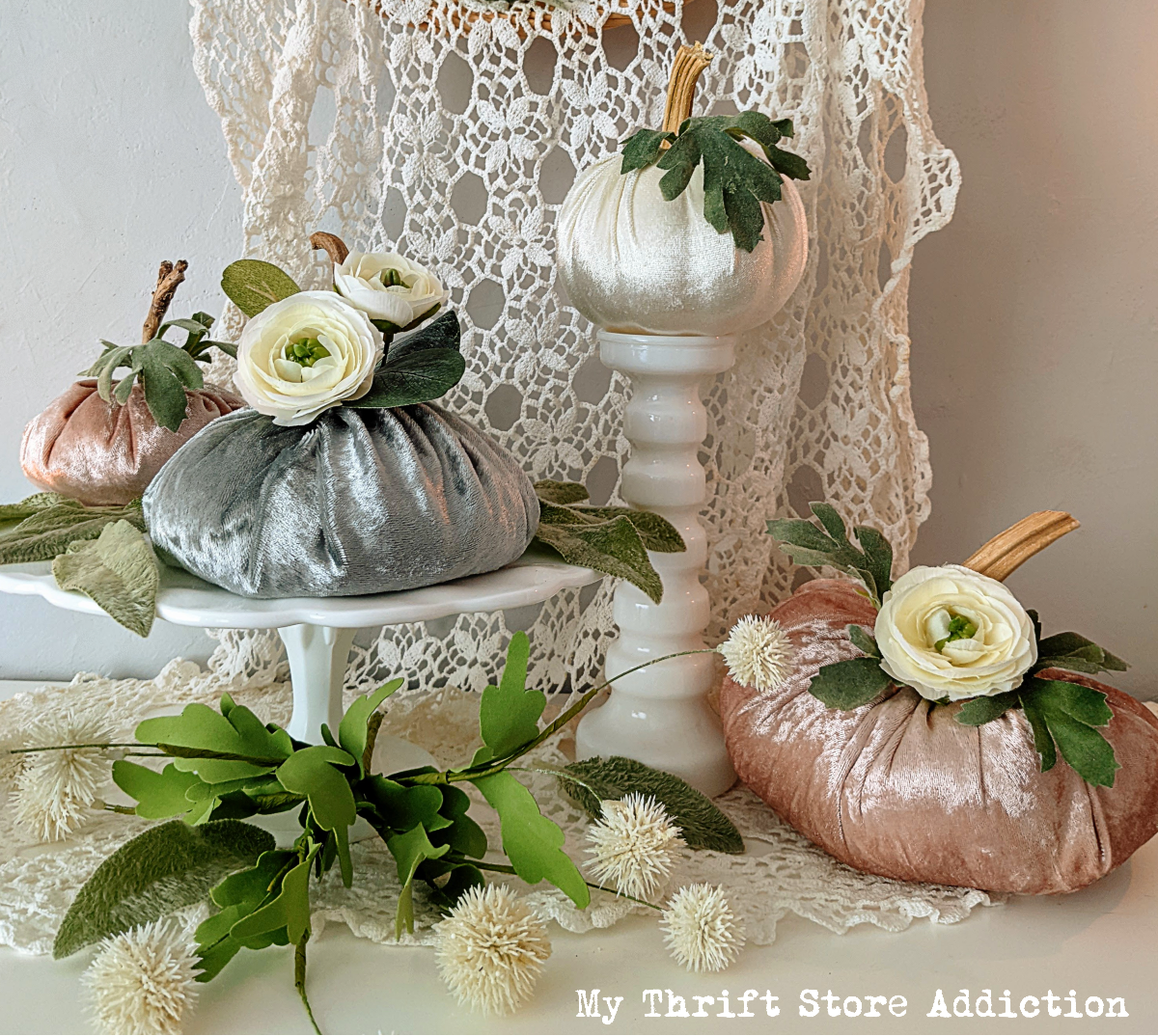 fall mantel featuring velvet pumpkins