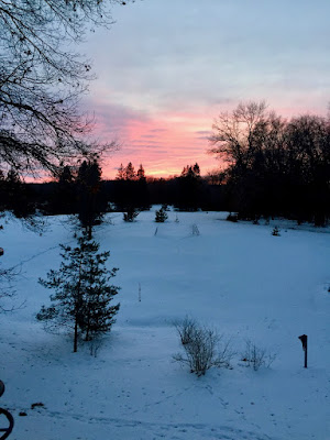 photo of snow-covered field at sunset 3/22/233