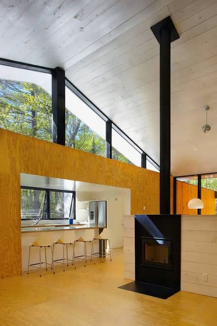 Minimalist Prefab Cottage Modern  Design  in Small Forest 
