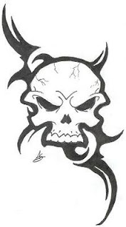 Skull Tribal Tattoo Design 