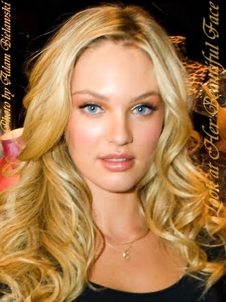 Candice Swanepoel Long Blonde Wavy Hairstyle All these curve elements 