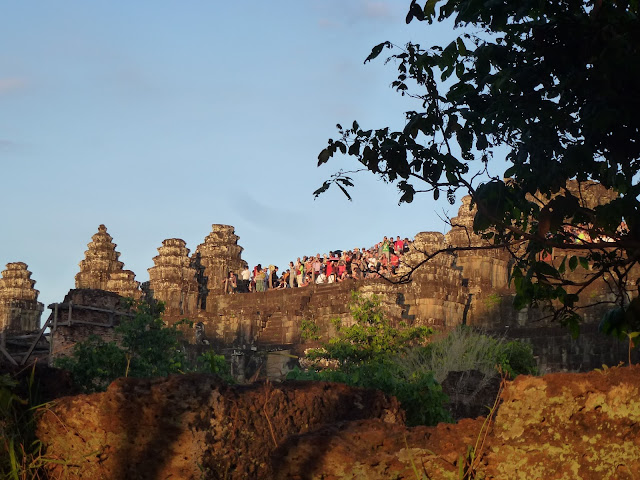 The stance of Angkor Wat relfecting on the H2O Travellers tips for Siem Reap, Cambodia