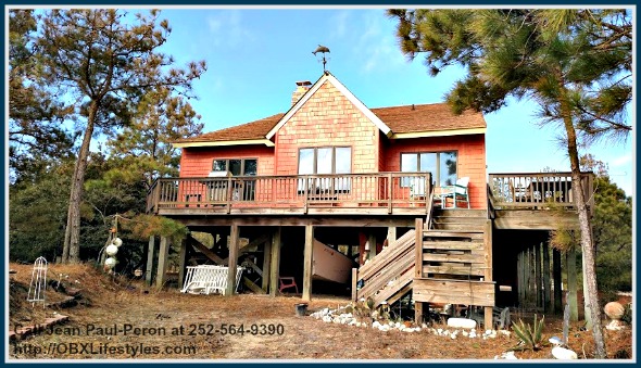 This 4 bedroom canalfront home for sale in OBX NC allows future homeowners to enjoy the gorgeous Outer Banks landscape.