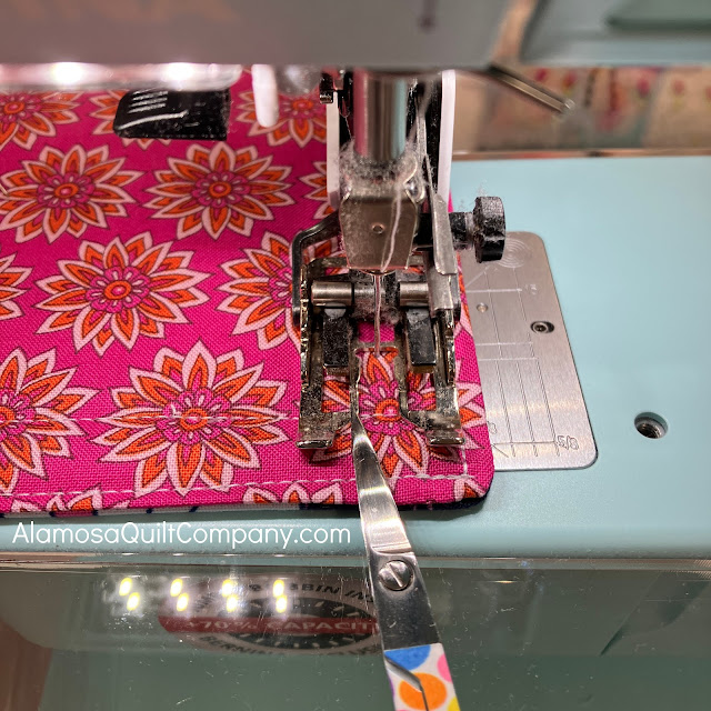 showing where to stop the first line of quilting and pivot