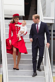 WINDY HAZARD: Kate struggled to cope with the wind with one hand while holding Prince George in her arm when she arrived in New Zealand.