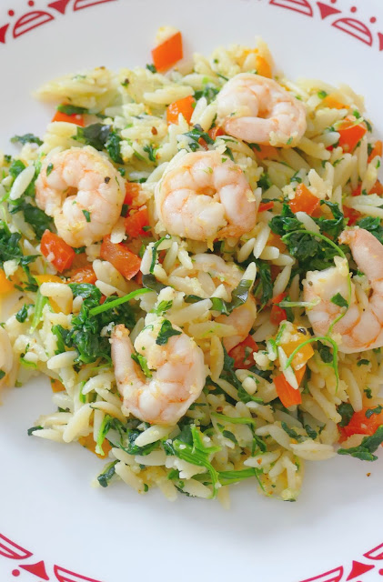 This simple and tasty lunch or dinner idea is packed full of delicious vegetables, fresh basil, garlic and lemon pepper along with the shrimp, orzo, parmesan cheese, bell pepper and spinach! It's ready in less than 30 minutes and you can omit the shrimp to make it completely meatless!