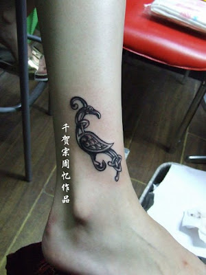 This tattoo design is a typical tattoo design for girls - looks cute but no 