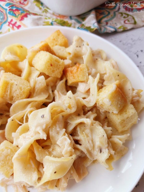 Cupboard Casserole! A super quick and easy casserole recipe using canned chicken, egg noodles and cream soup – all items from your cupboard or pantry! – topped with buttered bread cubes then baked until toasty.