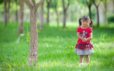 baby-enjoying-beauty-of-natural-pictures