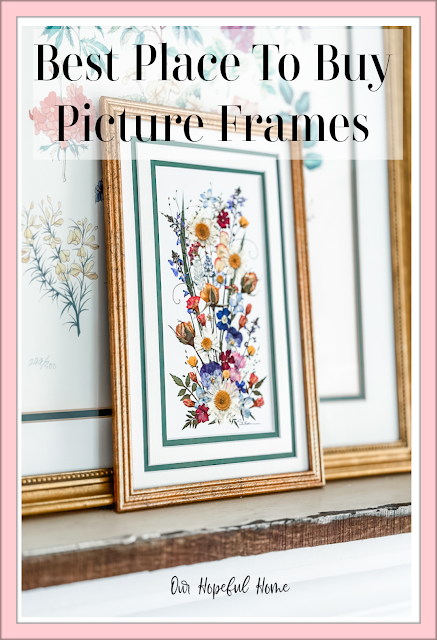 gold frame pressed flowers mantel artwork