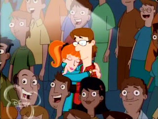 Cena em que Linda e Lawerence se beijam pela primeira vez durante um show da banda Love Händel, no desenho animado Phineas e Ferb