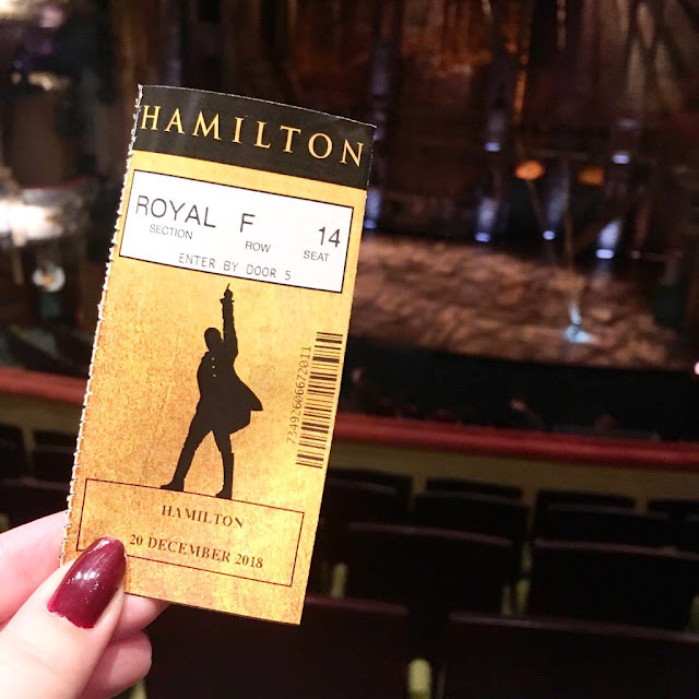 Hamilton at the Victoria Palace Theatre - ticket with stage in background