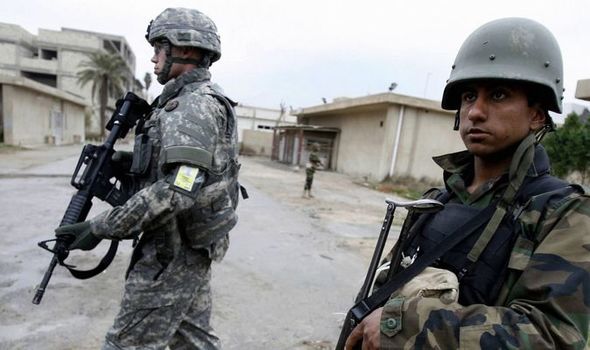 Iraqi forces raid HQ of Iran-backed militia as US coalition denies any involvement