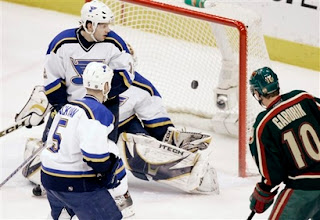 Marian Gaborik scores on a feed from former Blue Pavol Demitra.