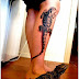 Gorgeous women leg with Lizard Walking Tattoo