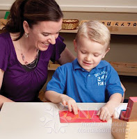 best advice to a new NAMC montessori teacher from other teachers helping child with sandpaper letters