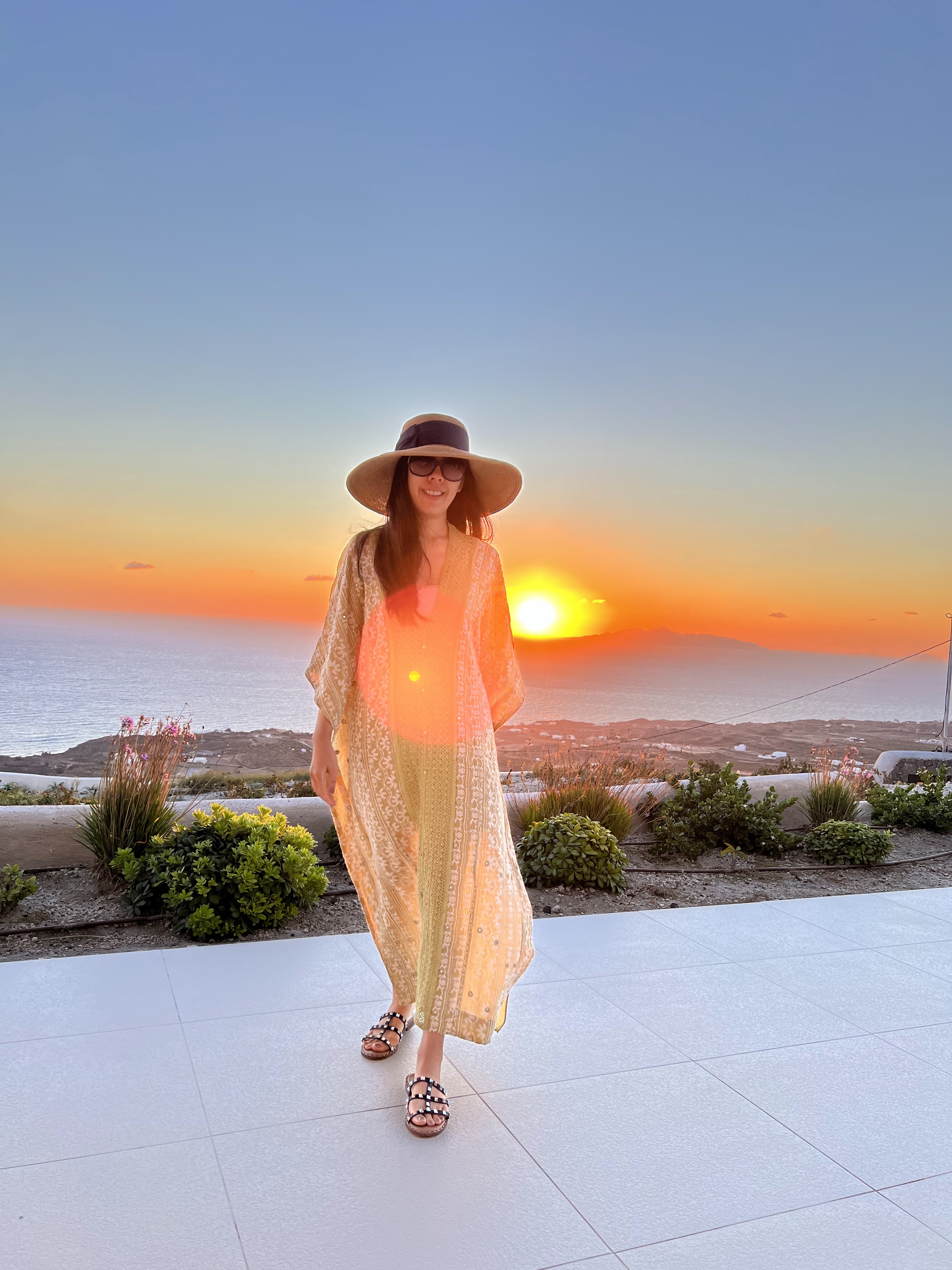 Adrienne Nguyen_What to do in Santorini_Sunrise in Santorini_Imerovigli_What to Wear in Santorini_Green Maxi Kaftan Dress at Private Villa in Front of the Sunrise in Santorini_Mardanza Exclusive Deluxe Private Villa with Pool and Sea View